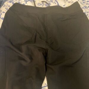 Brand new Mandela scrub pants in black. Worn once. Medium petite.